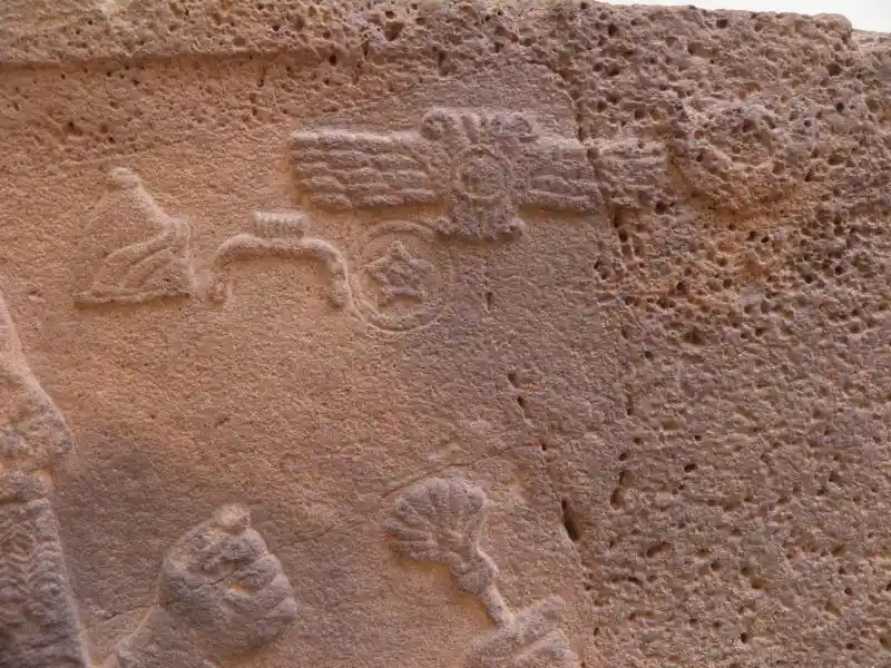 A winged disc engraved on an ortohstat